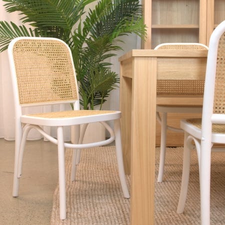 Stylish dining setting featuring Midland Extension Dining Table with matching chairs.
