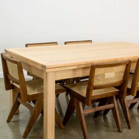 Stylish dining setting featuring Midland Extension Dining Table with matching chairs.